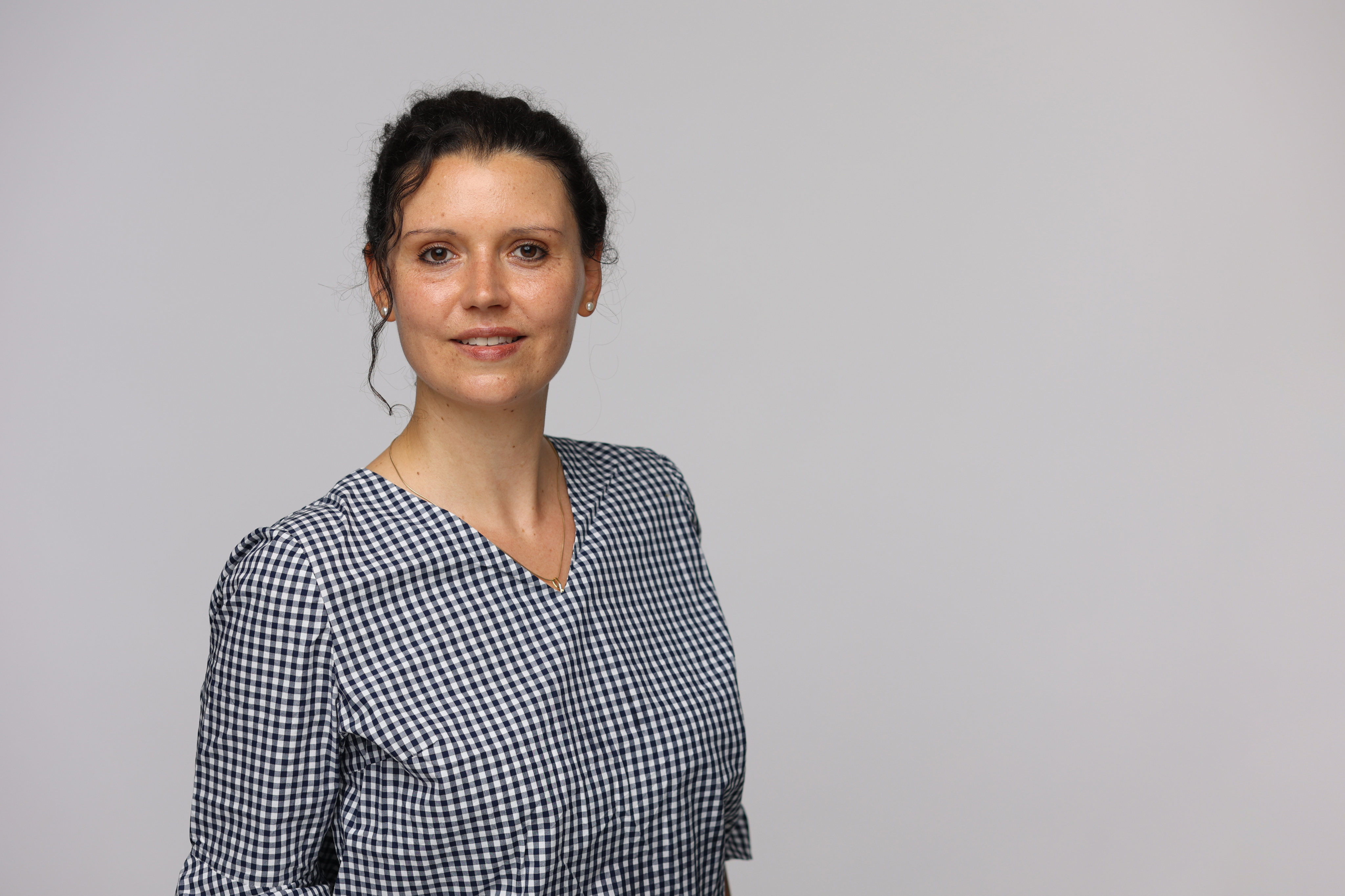 Portrait of Jasmin Dawes, a UX Designer